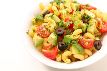 pasta salad with avocado, tomato and olive