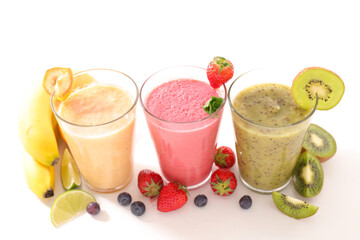 glasses of fresh smoothie on white background