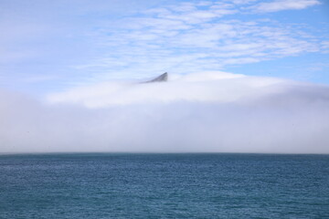 View of a mountain in clouds near South Georgia Island