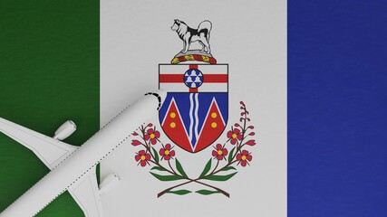 Top Down View of a Plane in the Corner on Top of the Flag of Yukon