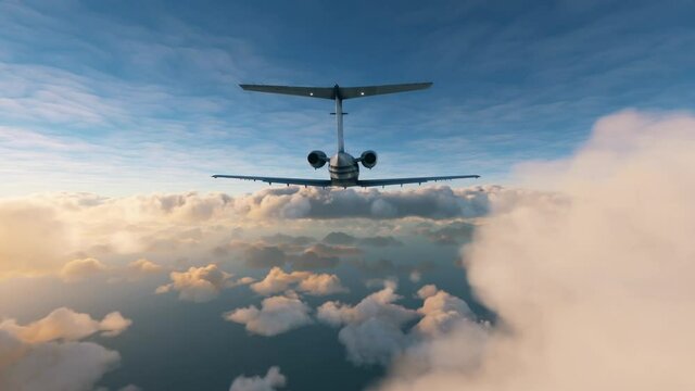 Rear view of a private airplane flying over clouds: Aerial view of a small jet plane during a flight between two layers of clouds during sunset