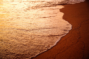 sand beach at morning in warming sunrise