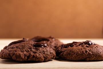 close up of chocolate cookies with copy space