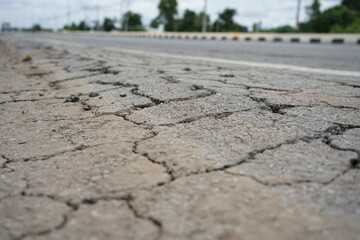 Obraz premium Damaged roads are dangerous for road users.
