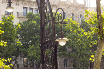 Detail of traditional streetlight located in Gracia Street, Barcelona, Spain.