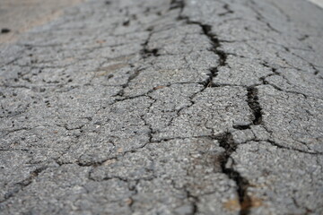 Damaged roads are dangerous for road users.