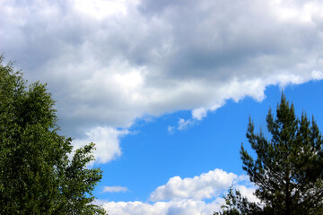 Blue sky background with a different clouds