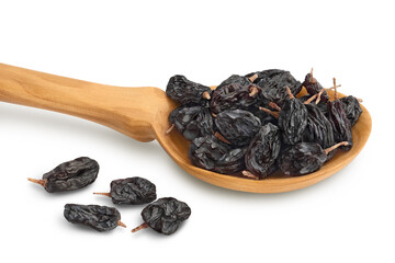 Yellow raisins in wooden spoon isolated on white background with clipping path and full depth of field