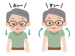 深呼吸をしながら両肩を上下に動かすシニア男性