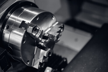 Fototapeta na wymiar Closeup tailstock Detail machine CNC milling processes steel part on Industrial factory