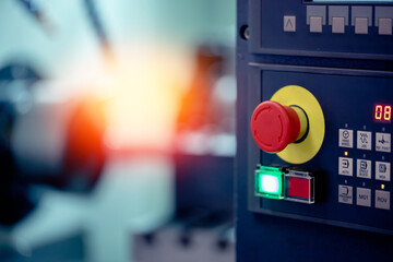 Red button of control panel CNC Alarm on automatic metal processing machine, concept of compliance with safety and labor protection - obrazy, fototapety, plakaty