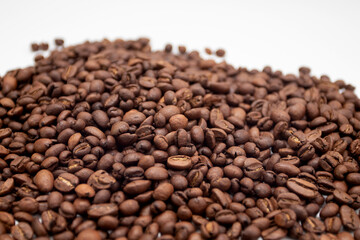 Coffee beans isolated on white background. Fresh roasted coffee beans