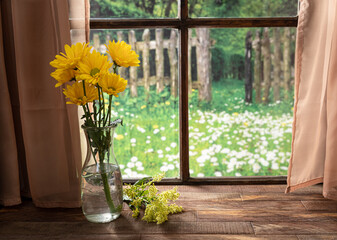 Yellow Daisies in a Vase on a Table
