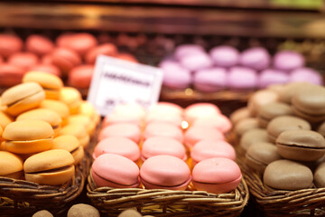 french macarons on counter of market