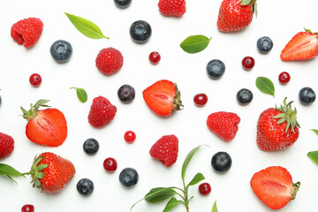Fototapeta na wymiar Delicious fresh berry mix on white background