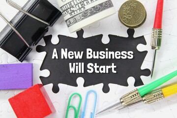 arrows, money, paper clicks, wooden cubes and words a new business will start