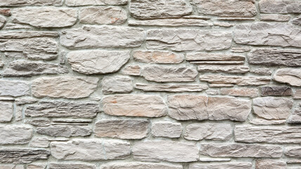 Stone light wall texture background as backdrop or texture. Part of a stone wall. Copy space.