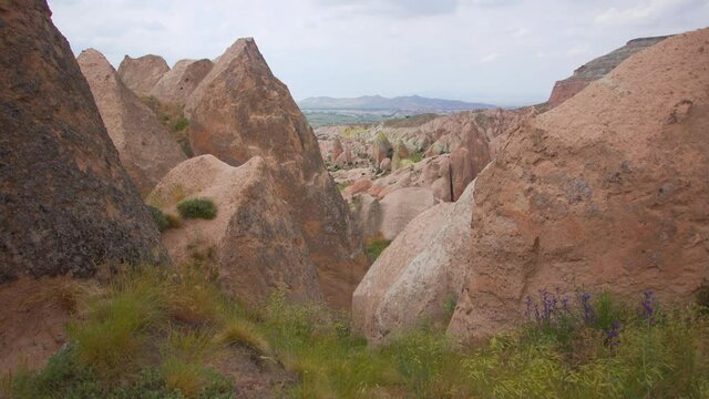 4k video panorama of one valey of many amazing scenic rocky valleys with many hills and mountains in spectacular picturesque Cappadocia, Turkey, Anatolia