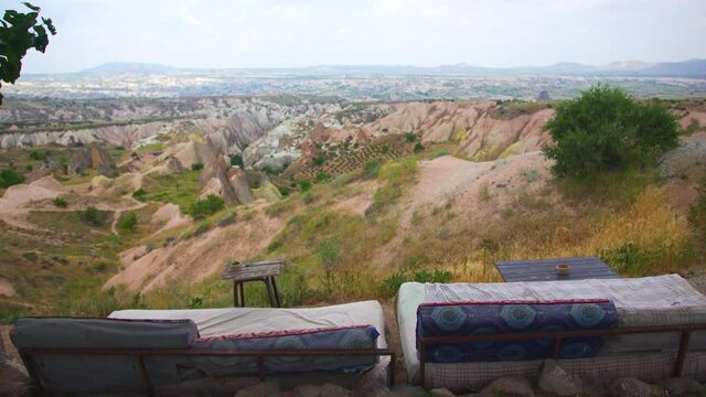 4k stock video footage of empty seats and tables isolated on amazing scenic Cappadocia landscapes