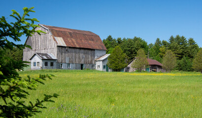 Fototapeta na wymiar Old barn on a farm in the countryside