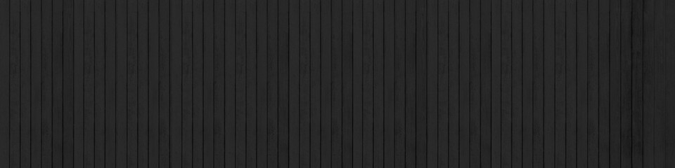 Panorama of Old black vintage wooden wall pattern and seamless background