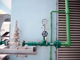 Pressure gauge of measuring instrument close up in industry zone at power plant.