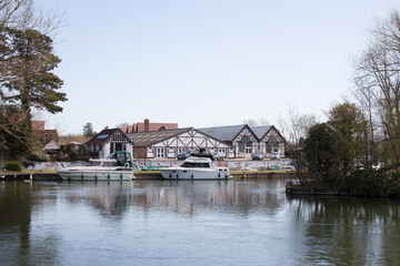 Fototapeta na wymiar Buildings and boats along the Thames at Maidenhead in the UK