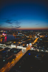 Naklejka premium Aerial view of the night modern Yekaterinburg city. Bright lights of the night streets. 