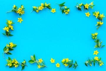Spring card mockup with yellow flowers with leaves, top view
