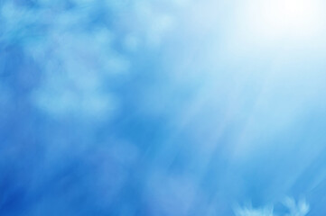 Light blue Leaf background. Blurred leaves and circular bokeh. Abstract for design and wallpaper.
