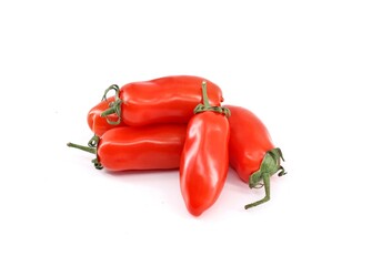Small San Marzano tomatoes, an italian variety of plum tomato,   on white background. They are...