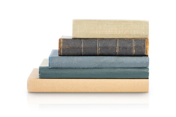 A stack of old books isolated on a white background. Back to school and education concept.