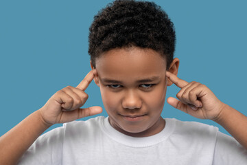 Close-up face of boy feeling bad