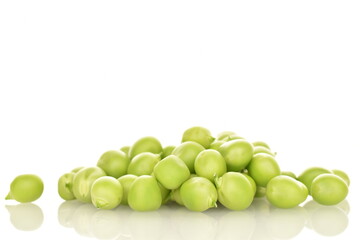 Several ripe green peas, close-up, isolated on white.