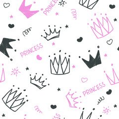 Hand drawn seamless pattern with doodle crowns. Cute baby and little princess design. Children's room wallpaper and clothes texture.