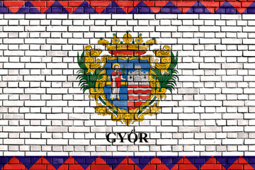 flag of Gyor painted on brick wall