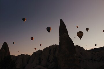 hot air balloon parade in cappadocia at sunrise