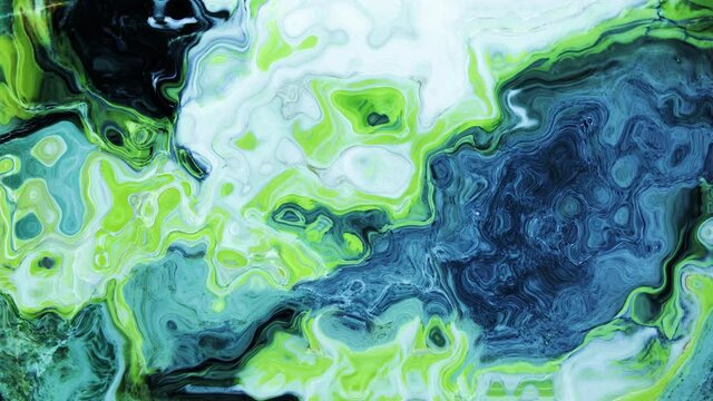 Animation of vibrant coloured green and blue liquid flowing in hypnotic motion