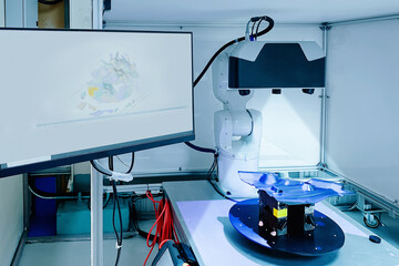 Inspection part dimension by 3D scan measuring machine.