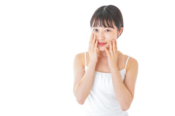 Fototapeta premium 肌のケアをする若い女性