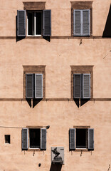 Fototapeta na wymiar Old architecture in the streets of Siena in Italy