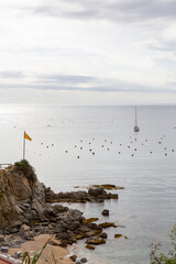 breakwater, sea, beach and rocks in Palafrugell