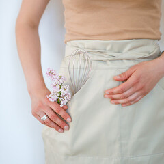 A pastry chef bakes a cake in the home kitchen. Home business.