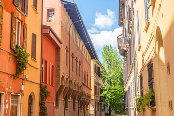 Fototapeta na wymiar Streets and old houses in the historic center of Bologna