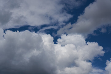  Cumulus big clouds on the blue sky