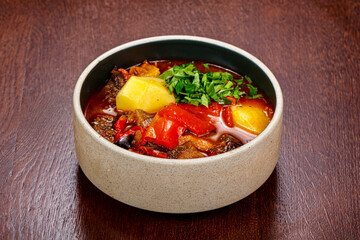 Tasty soup with vegetables and herbs