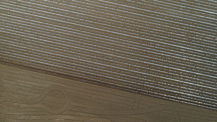 Potato covered with plastic film in the field, North China