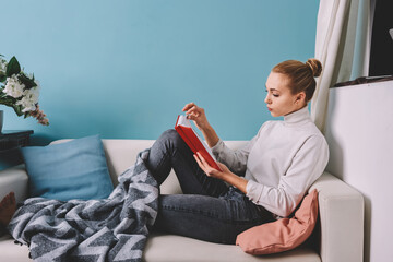 Fototapeta na wymiar Calm woman reading book during break