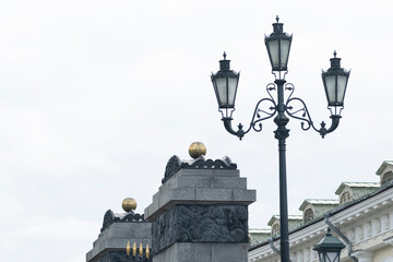 Fototapeta na wymiar street lamp against gray sky