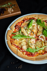 Seafood Pizza ,hand pick pizza, eating pizza and having fun. leisure, food and drinks, people and holidays concept